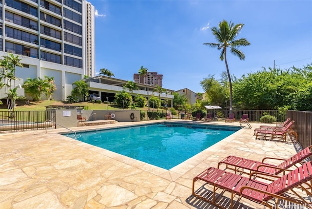 view of swimming pool featuring a patio