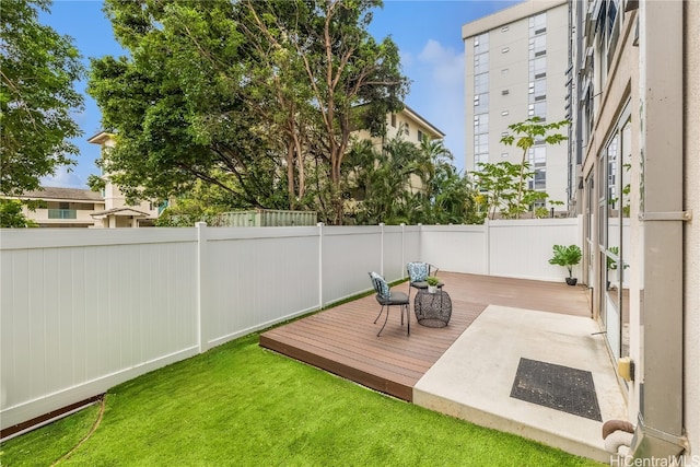 view of yard featuring a wooden deck