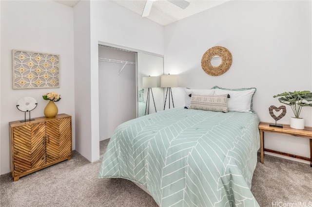 carpeted bedroom featuring a closet and ceiling fan