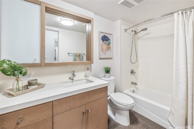 full bathroom featuring toilet, shower / bathtub combination with curtain, vanity, and wood-type flooring