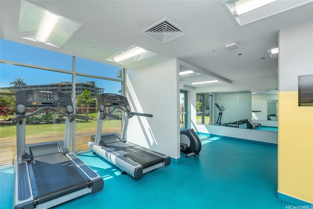exercise room featuring visible vents