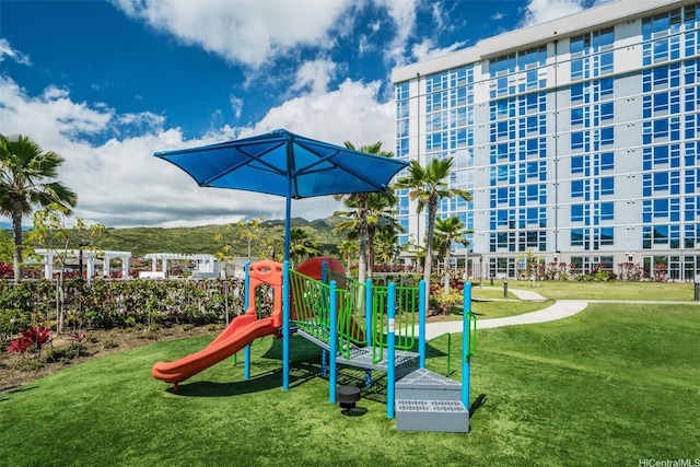 community play area featuring a yard