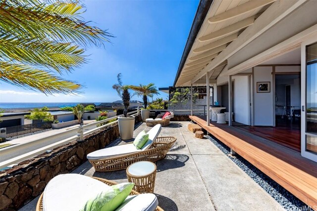 view of patio / terrace with a water view