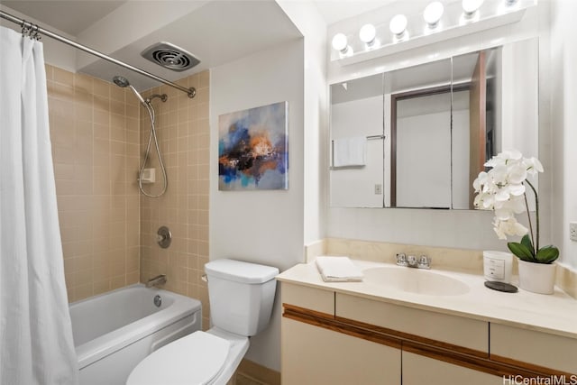 full bathroom featuring vanity, shower / bath combo, and toilet