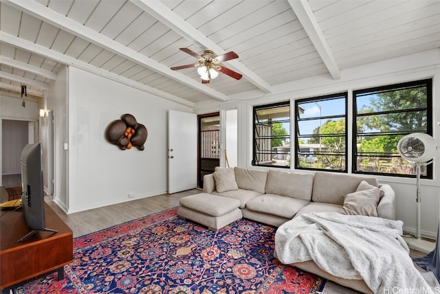 living room featuring vaulted ceiling with beams, wood-type flooring, wooden ceiling, and ceiling fan