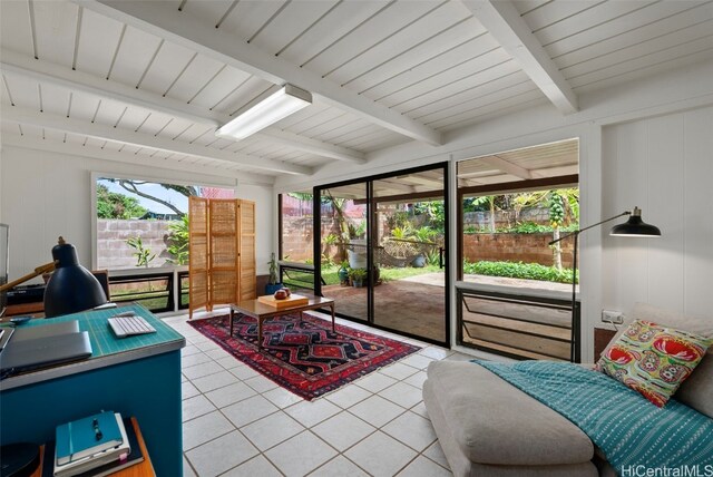 tiled living room with beamed ceiling