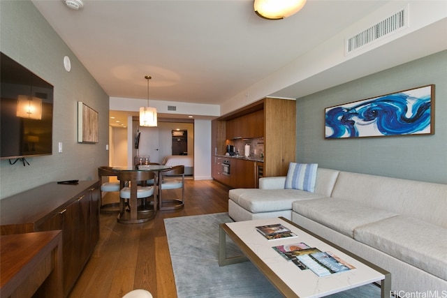 living room with dark wood-type flooring