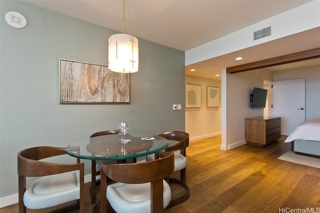 dining area featuring hardwood / wood-style flooring