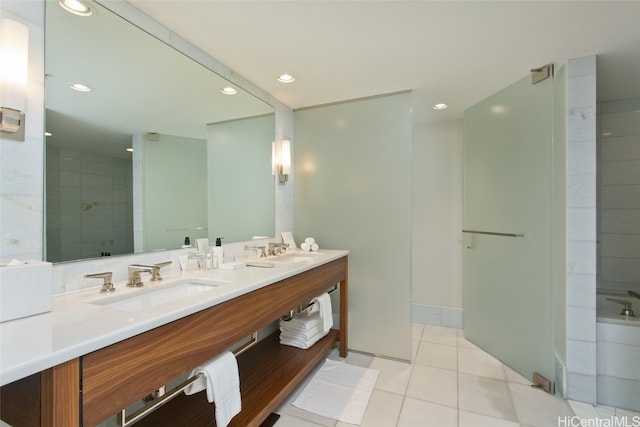 bathroom with vanity, tile patterned floors, and separate shower and tub