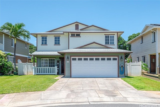 traditional home with a garage, a front yard, driveway, and fence