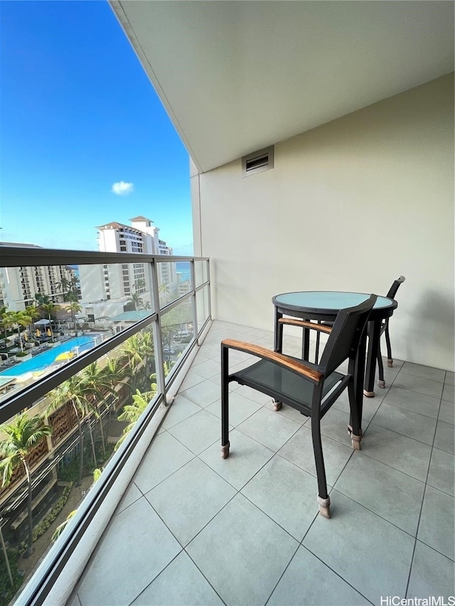 223 Saratoga Rd Unit 1108, Honolulu, HI 96815 - balcony with view of pool area and a baseboard radiator