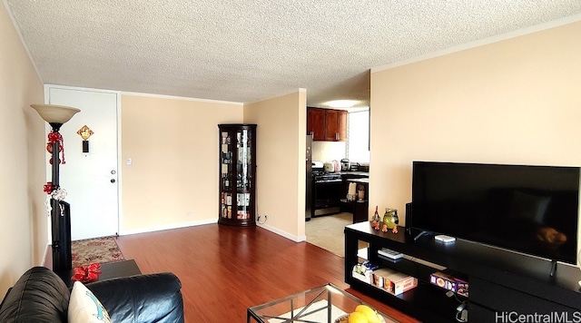 living room featuring a textured ceiling and hardwood / wood-style flooring