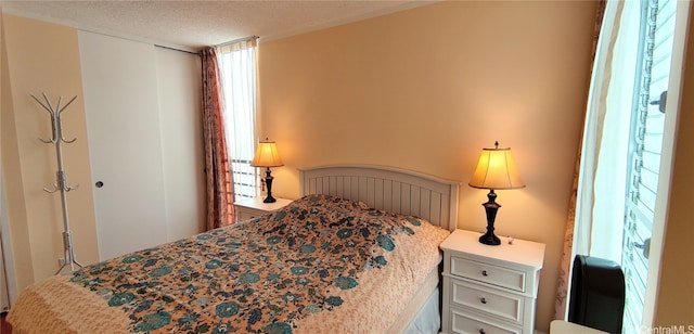 bedroom with a textured ceiling