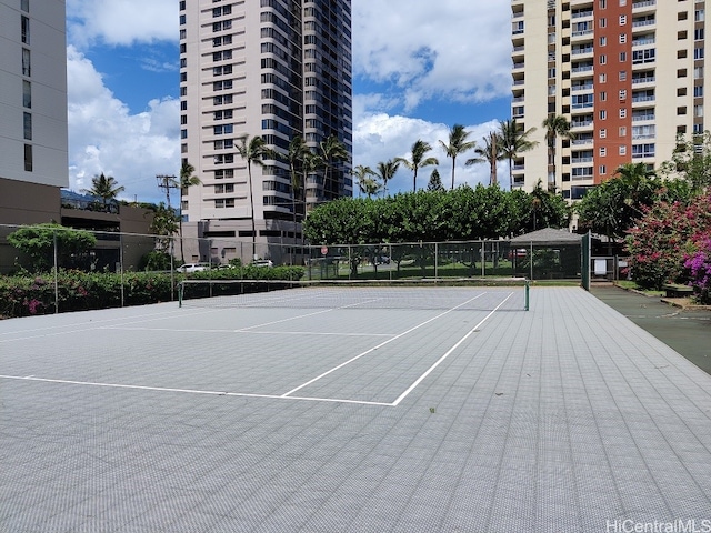 view of tennis court with basketball court