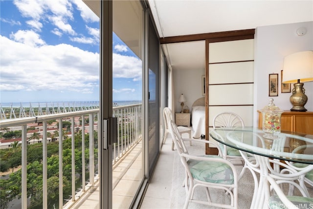 balcony featuring a water view