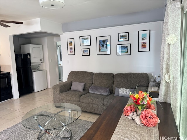 living room with light tile patterned floors and ceiling fan