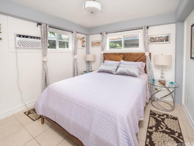 tiled bedroom with multiple windows and a wall mounted AC