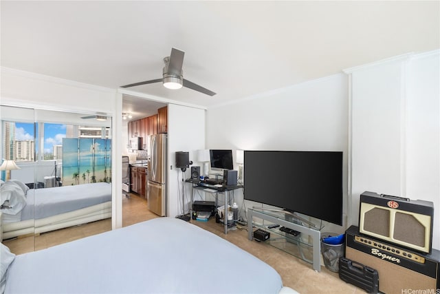 425 Ena Rd Unit 1202A, Honolulu, HI 96815 - bedroom featuring crown molding, freestanding refrigerator, a ceiling fan, and light tile patterned flooring
