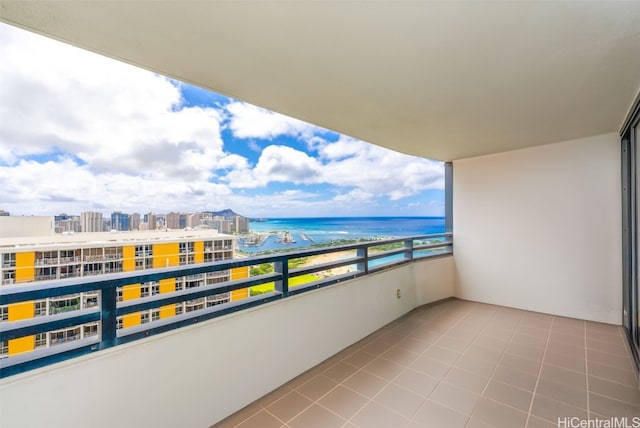 balcony featuring a water view