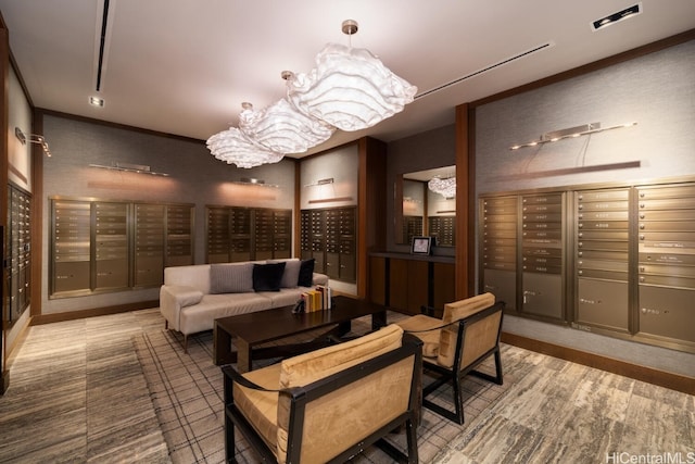 interior space featuring mail boxes and an inviting chandelier