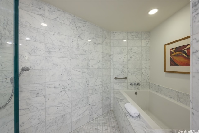 bathroom with shower with separate bathtub