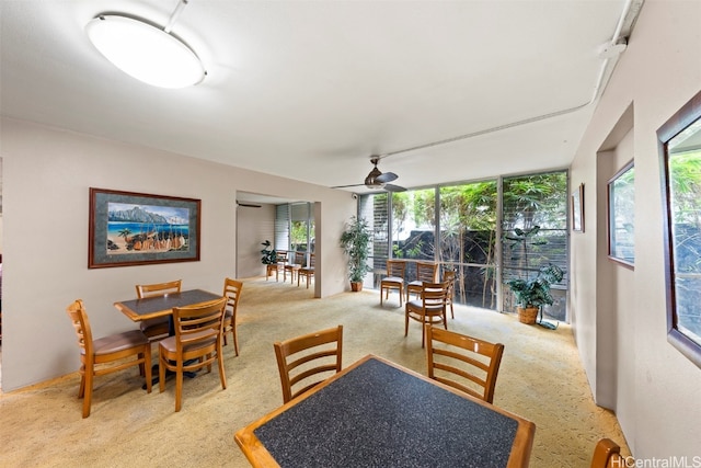 dining room featuring ceiling fan