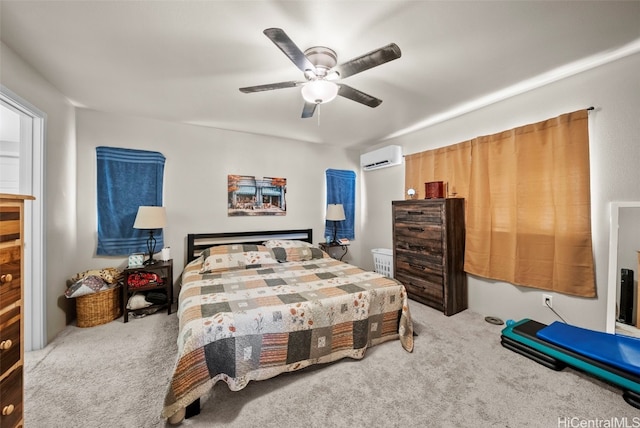 carpeted bedroom with an AC wall unit and ceiling fan