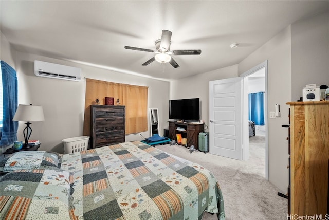 carpeted bedroom featuring a wall mounted air conditioner and ceiling fan