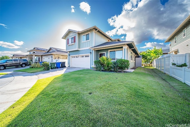 view of front of house with a front lawn and a garage