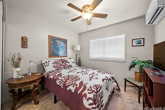 carpeted bedroom featuring a wall mounted AC and ceiling fan