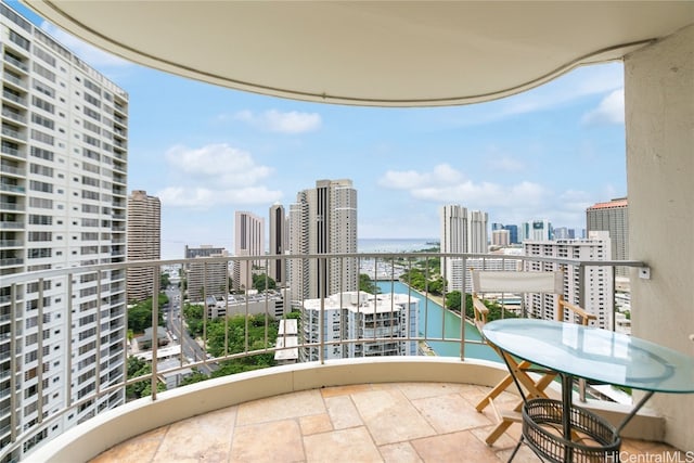 balcony featuring a water view