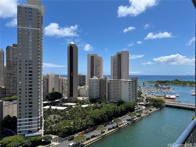 property's view of city featuring a water view