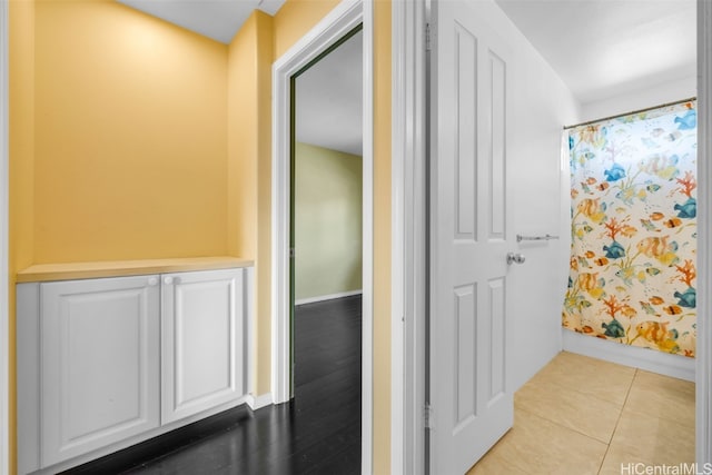 hallway with light wood-type flooring