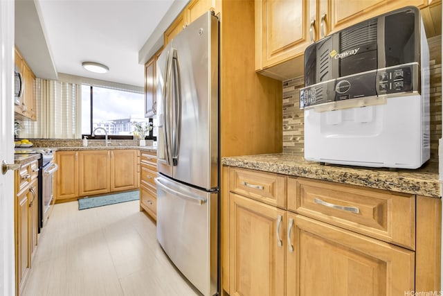 2724 Kahoaloha Ln Unit 1007, Honolulu, HI 96826 - kitchen with stainless steel appliances, decorative backsplash, light stone counters, a sink, and light brown cabinetry