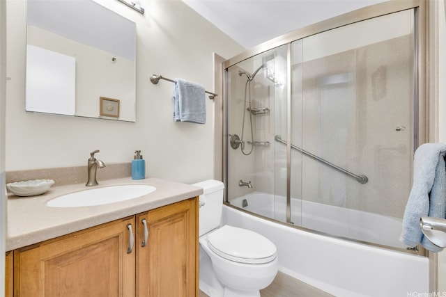 2724 Kahoaloha Ln Unit 1007, Honolulu, HI 96826 - bathroom with toilet, vanity, and bath / shower combo with glass door