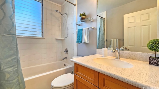 full bathroom with vanity, toilet, and shower / bath combo