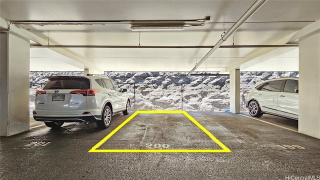 garage featuring a carport