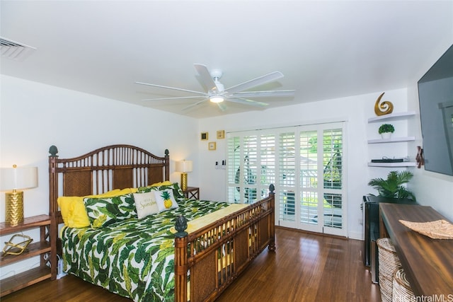 bedroom with access to exterior, dark wood-type flooring, and ceiling fan