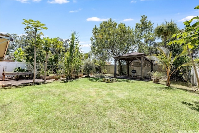 view of yard with a gazebo and a patio