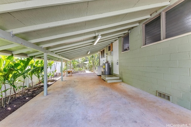 view of patio / terrace featuring water heater