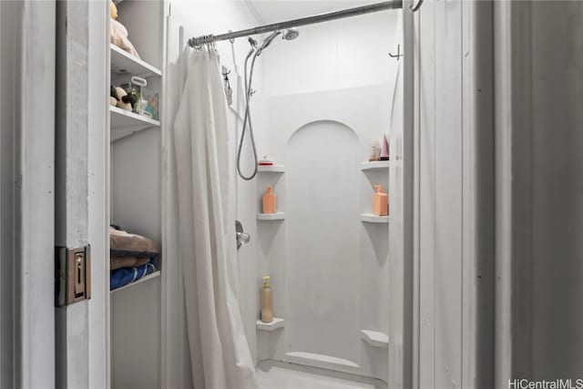 bathroom with curtained shower