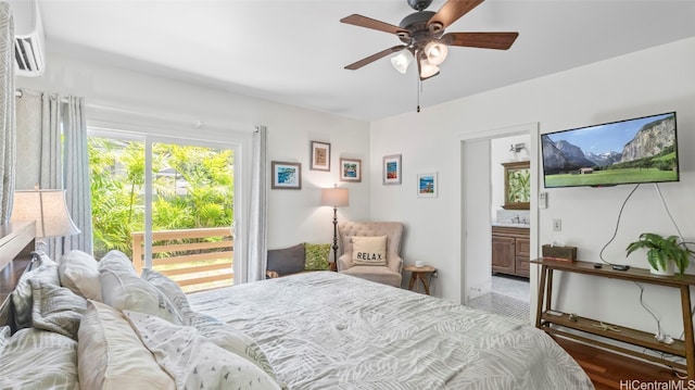 bedroom featuring ensuite bathroom, wood-type flooring, and ceiling fan