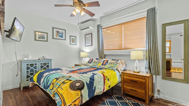 bedroom featuring dark wood-type flooring, a wall mounted air conditioner, and ceiling fan