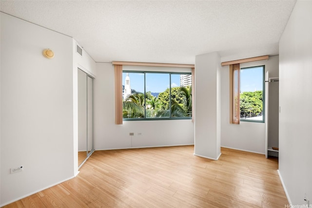 1314 Kalakaua Ave Unit 513, Honolulu, HI 96826 - unfurnished bedroom with light wood-style flooring and baseboards