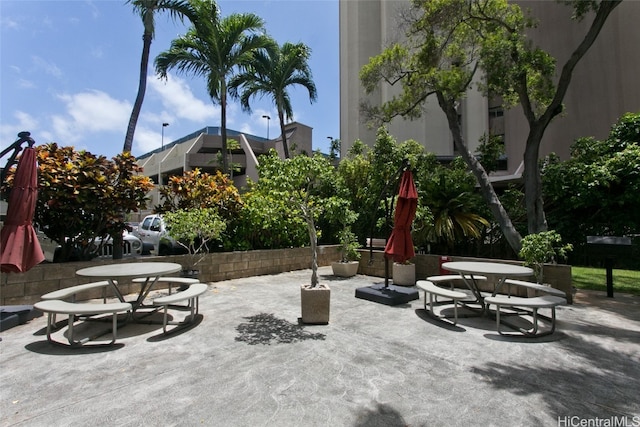 surrounding community featuring a patio