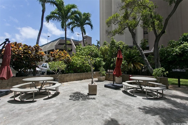 view of property's community featuring a patio
