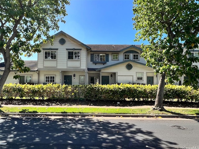 91-1051 Keoneula Blvd Unit E3, Ewa Beach, HI 96706 - view of front facade with a shingled roof