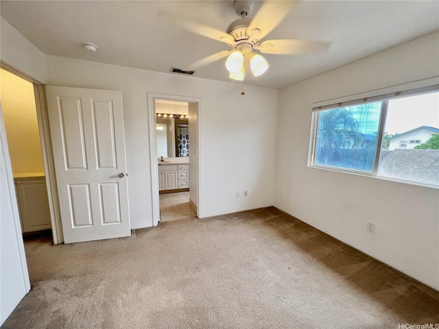 91-1051 Keoneula Blvd Unit E3, Ewa Beach, HI 96706 - unfurnished bedroom featuring carpet, ensuite bathroom, and ceiling fan
