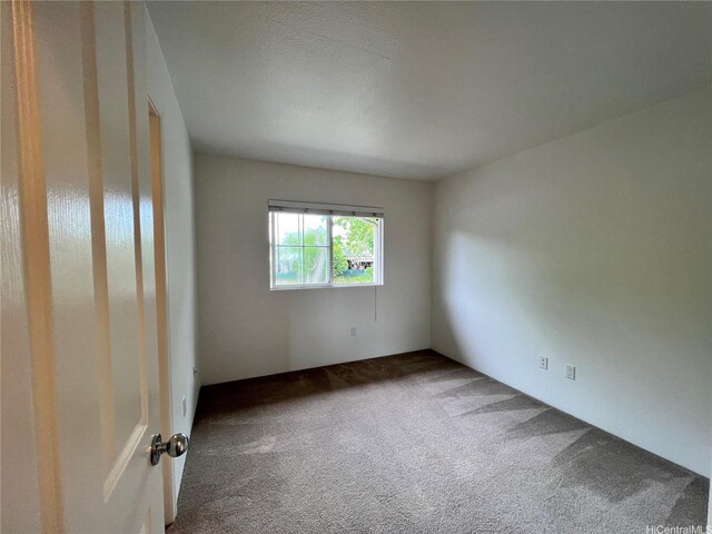 91-1051 Keoneula Blvd Unit E3, Ewa Beach, HI 96706 - spare room with carpet floors