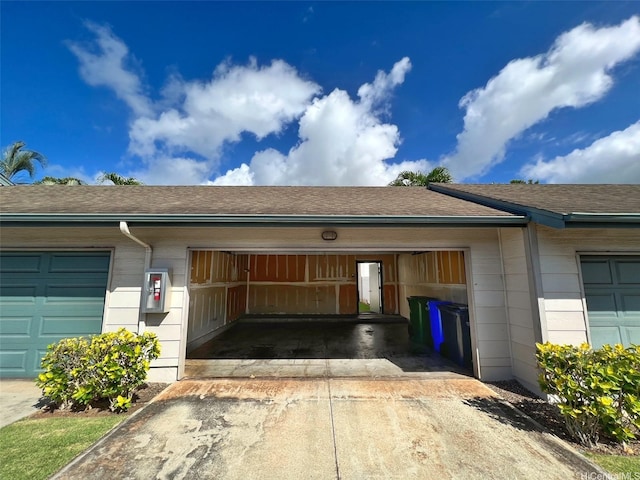 91-1051 Keoneula Blvd Unit E3, Ewa Beach, HI 96706 - garage featuring driveway